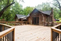 Vintage charm meets modern comfort in this historic 1850s cabin at Lake Hartwell