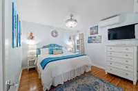 Chic 2BR Retreat - Steps to Beach, Exclusive Patio, Garage Parking
