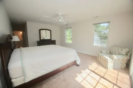 Large Bethany home private waterfront near food shops ice cream minigolf & beach