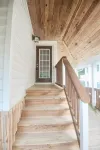 Large Bethany home private waterfront near food shops ice cream minigolf & beach