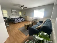 Large king guest room with private entrance and bathroom.
