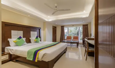 Treebo Suvarna Comforts Hotels near Prakash Enterprises