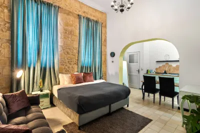 Helios Boutique Suites by la Finca Hotel Hotels near American Eagle Store