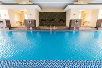 Pacific Bay Grand Suites - piscina