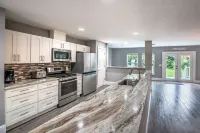 Beautiful tranquility, 1 block from the Indian River with heated pool