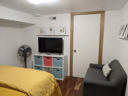 Lovely basement apartment with covered outdoor patio.