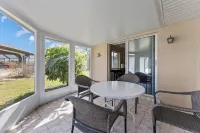Screened Porch with Canal View and Games - Charming Vintage Oasis