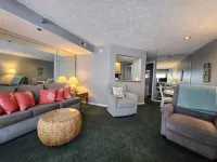 Balcony with Stunning Beach Views and Pool - Charming Coastal Haven