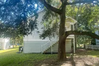 Sprawling coastal home with front porch, separate apartment, & AC - dog-friendly Hotels near Wacca Wache Marina