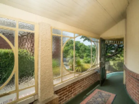 แมเนอร์ ออน เดอะ พาร์ค แบ็คแพ็คเกอร์ส โรงแรมในดันเนดิน