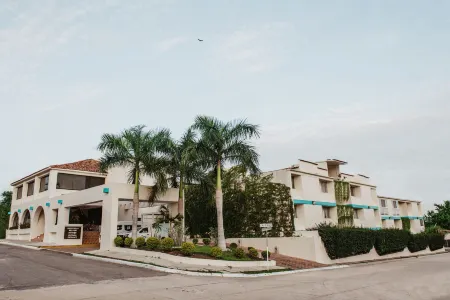 Hotel Suites Villasol Отели в г. Бахос де Чила