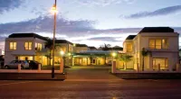 Pacific Harbour Motor Inn Hotels near Pouawa Beach