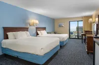 Coastal Palms Inn and Suites - balcón
