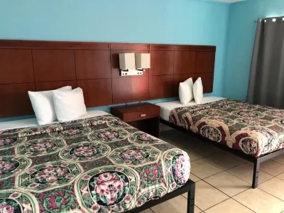 Economy Suites Hotels near MINILAND USA