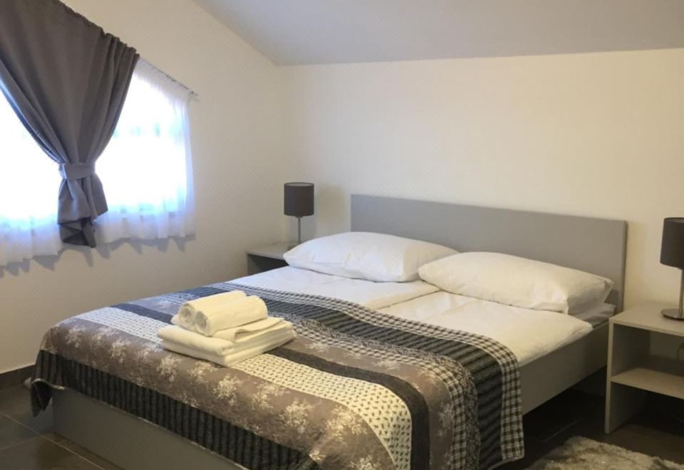 필리포비츠 렌트 어 카 & 아파트먼트의 아파트형 객실 주방 및 거실 공간