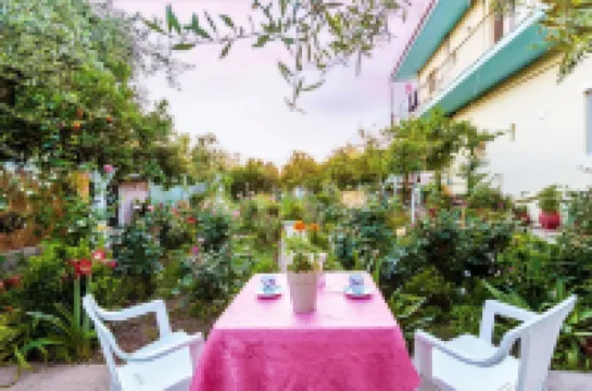 Summer Rose Garden Getaway - A Step to the Beach