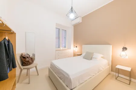 Castalia Apartments & Rooms Отели рядом с достопримечательностью «Палаццо Корвайя»