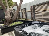 Beachy Bach - With Brand New Spa Pool! Hotels near Manawatu Caravan Club
