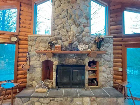 Riverfront Cabin Retreat – Sleeps Up to 18 on the Betsie River