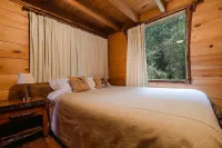 Cabañas del Bosque Huilo Huilo -  Habitaciones en casas particulares
