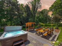 Outdoor Hot Tub and Cozy Living Space - Charming Farmhouse Retreat