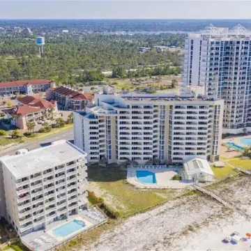 STUNNING 4TH FLOOR GULF FRONT CORNER UNIT with bunk beds