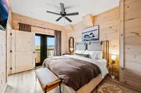 Lakefront home with retro accents, private pool, and private dock.