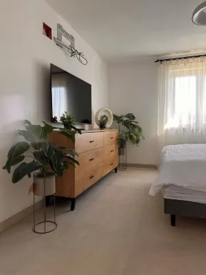 Modern apartment with roof terrace / balcony. Panoramic view of the sea. Hotels in Drage