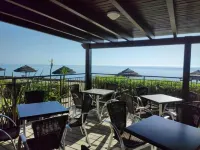 Apartment in residence with swimming pool and private beach