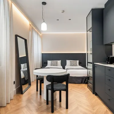 Pacifico Suites Near Retiro Отели рядом с достопримечательностью «Станция Santa Eugenia »