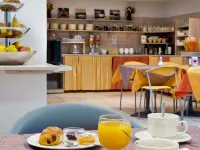 Aparthotel Adagio Access Rennes Centre - servizio colazione