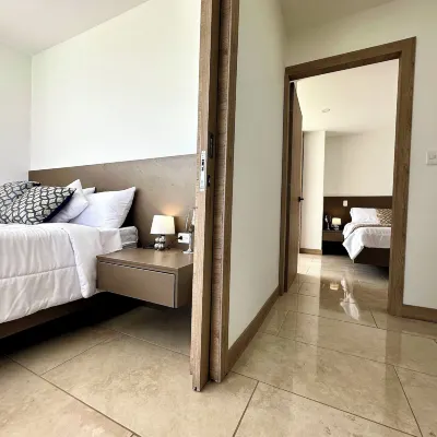 Urbanizable Suites UIO Hotels near Bicentenario Park