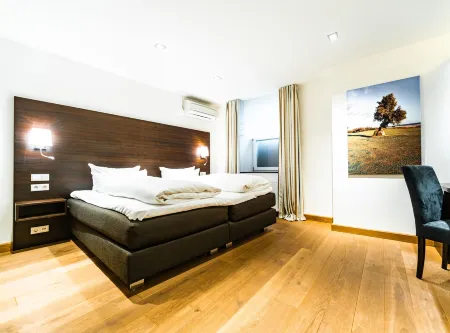 Romantik Hotel Walhalla Отели в г. Оснабрюк