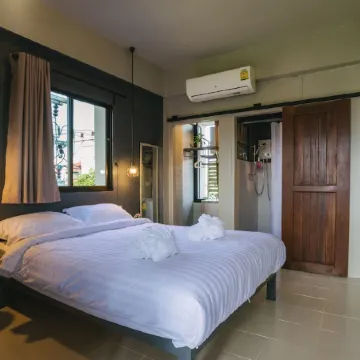 Cozy Inn Chiang Mai Отели рядом с достопримечательностью «Храм Ват-Пхра-Сингх»