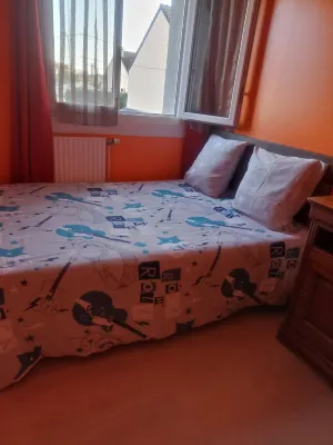 An orange room number 2 Hotels near RageBoat