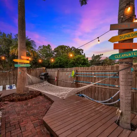 14 Guests · Large HEATED Pool · Tropical Backyard+BBQ · GYM · Beach: 3 miles
