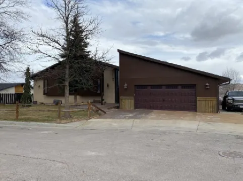 3,900 sq ft house with a big deck and a great view of the hills and canyon lake