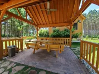 4 Bedroom lodge on wooded land with heated swimming pool and hot tub