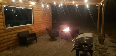 Modern Log Cabin with indoor and outdoor jacuzzi tubs