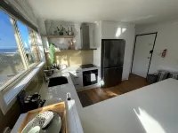 Across the road from the beach and 3 minutes walk to vibrant Peregian Village