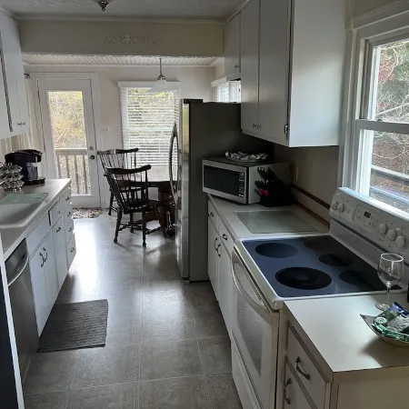 Cozy Cottage with access to and partially obstructed views of the bay.