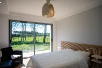 Villa à Messanges vue Large sur la Forêt 3 km de la Plage 5km du Golf de Moliets Hotels in Messanges