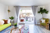 Spin Some Vinyl at a Lush Green Retreat with Two Bedrooms