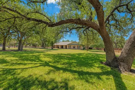 Beautiful Pool home on 2.5 acres with a serene country feel with urban location