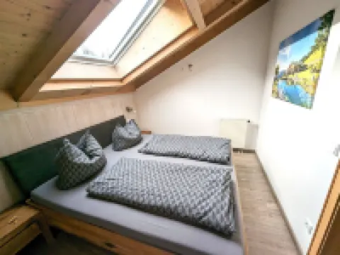 Cozy vacation apartment with two bedrooms, wood-burning stove and spacious balcony