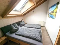 Cozy vacation apartment with two bedrooms, wood-burning stove and spacious balcony