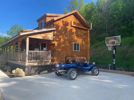 Cozy hillside retreat near trout stream, public forest and UTV trails.