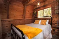 The Rustic Blue Cabin surrounded by Aspen Trees