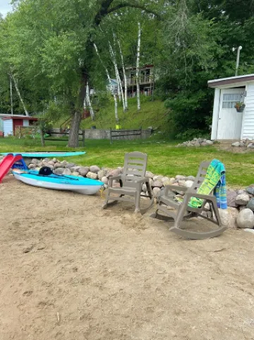 Charming up north cottage on all sports Peach Lake! Отели в г. Запад Бранч Тауншип