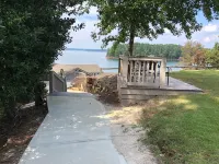 Cozy Lakefront Log cabin with miles of view plus small beach!